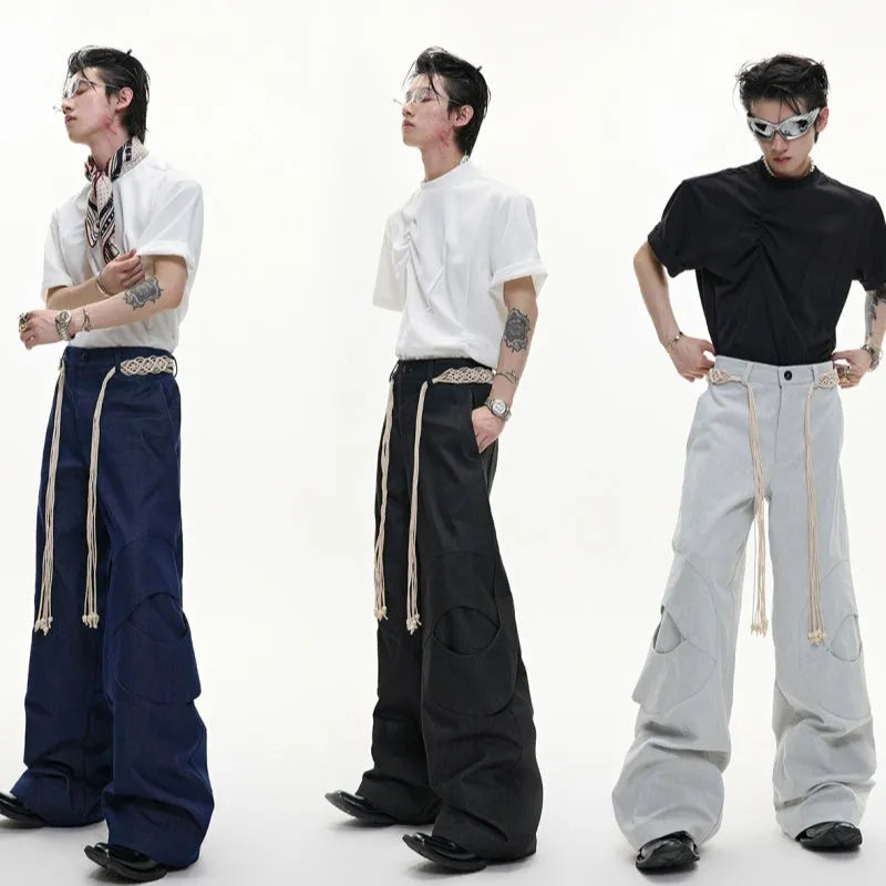 Men's cotton straight-leg trousers with micro-elastic fabric, zipper decorations, and tassel details in dark colour options