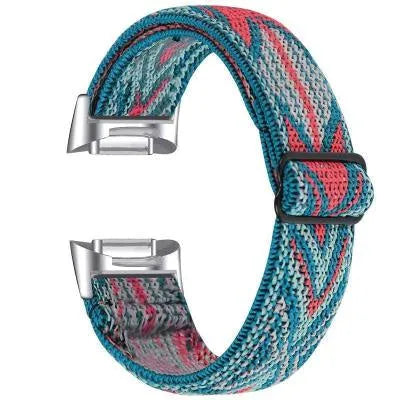 Adjustable printed elastic watch strap compatible with Fitbit Charge 6, shown in a vibrant colour design.