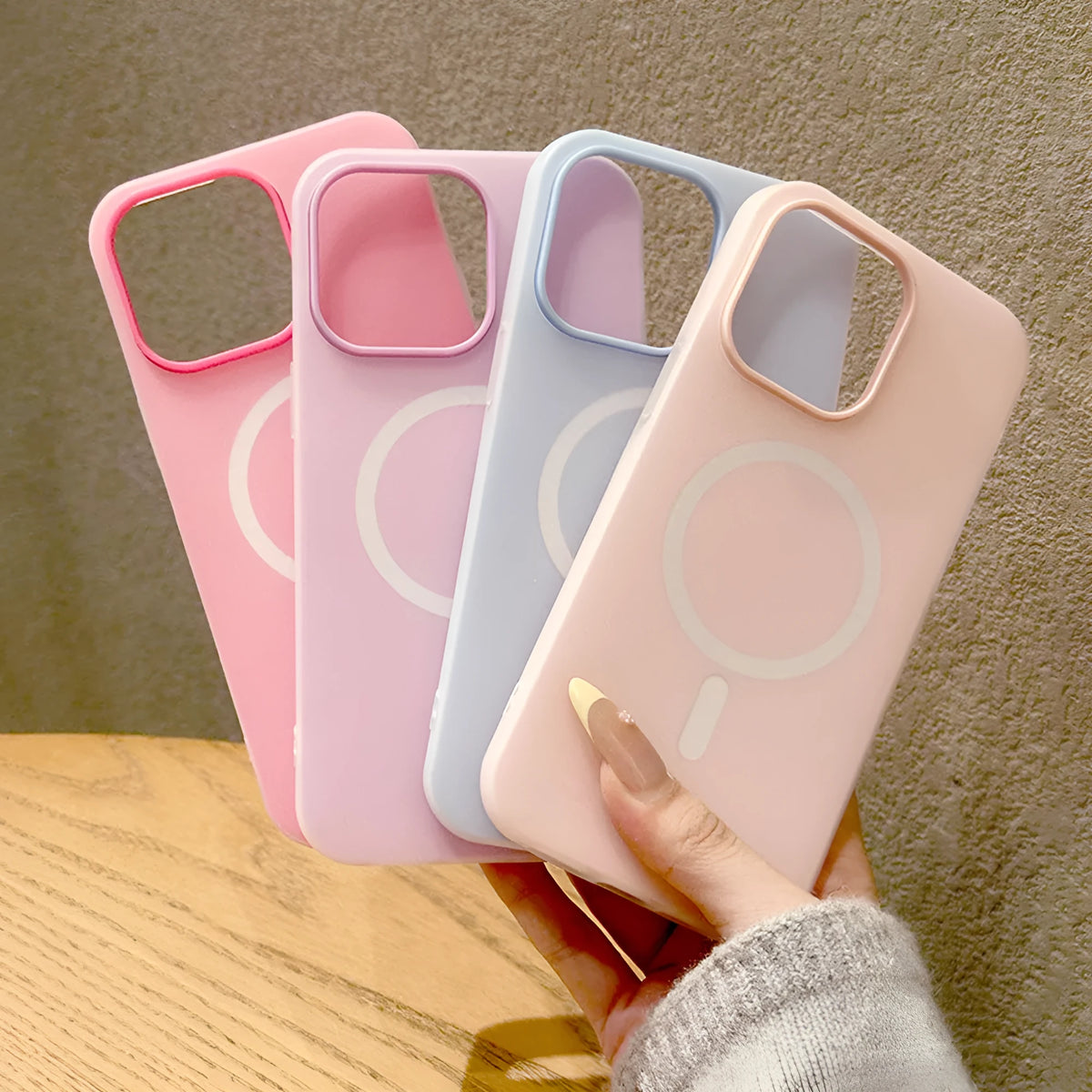 Double-layer magnetic phone case for iPhone 15 and 16 in beige, black, green, light yellow, orange, pink, rose red, light blue, purple.