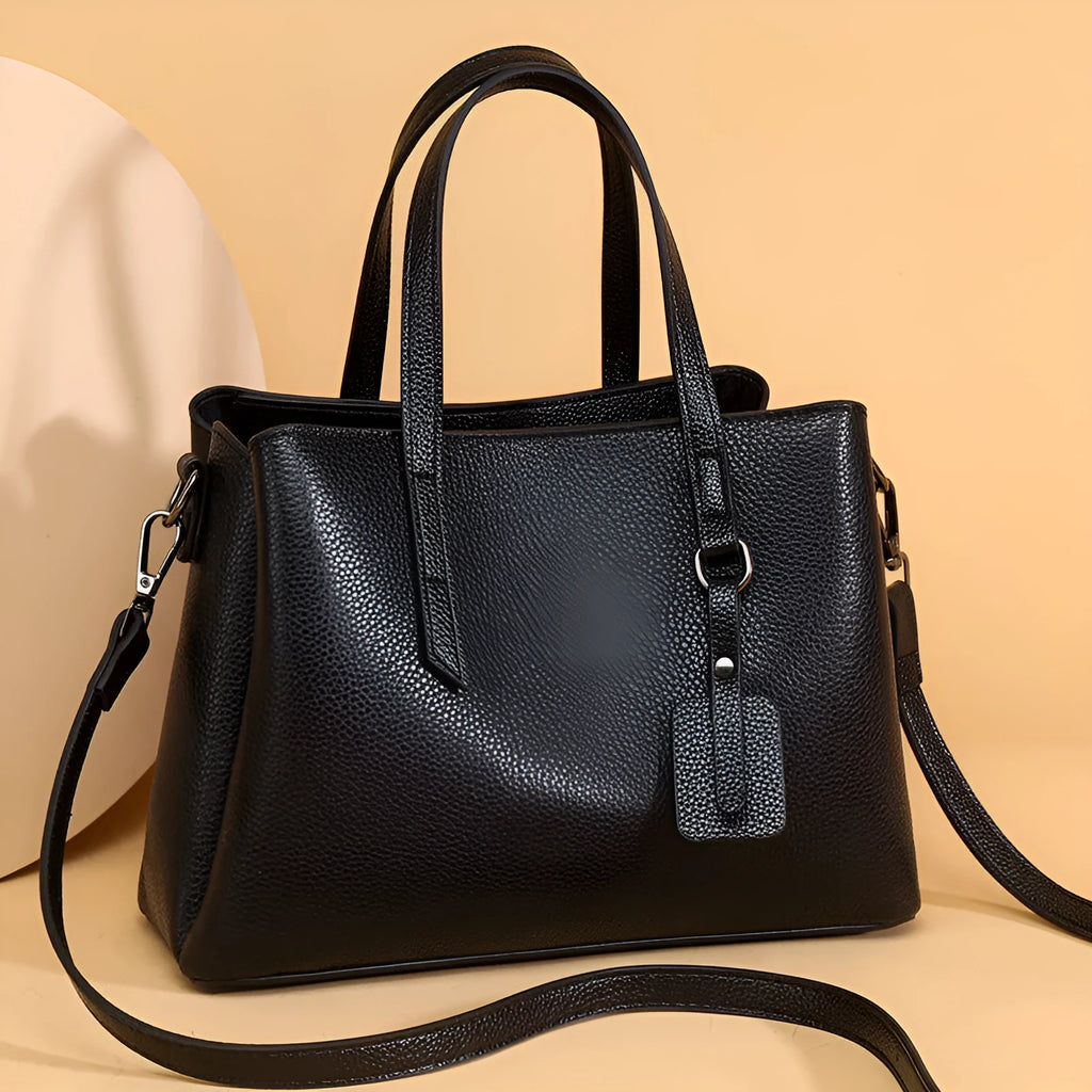 Women's cowhide leather shoulder handbag in horizontal square shape with contrast colour details and single strap