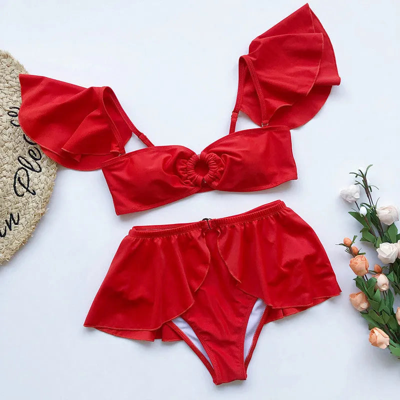 Women's red three-piece bikini swimsuit with flounced top and high-waisted briefs