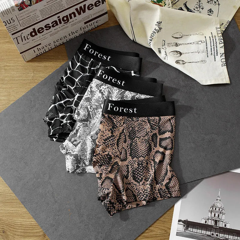 Men's thin polyester boxer shorts in loose fit mid-waist design available in black grey brown colours