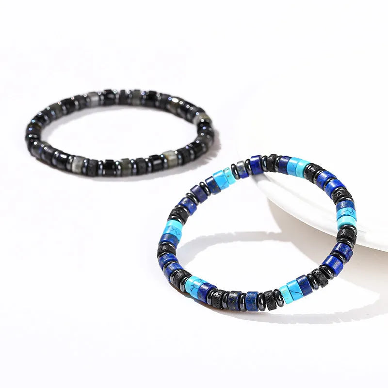 Natural hematite and volcanic rock bead bracelet for men with 6mm geometric beads.