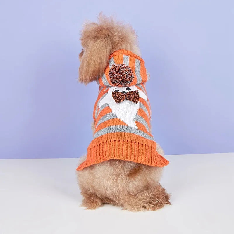 Orange Halloween pet sweater with striped pattern and hooded fur ball design for dogs and cats