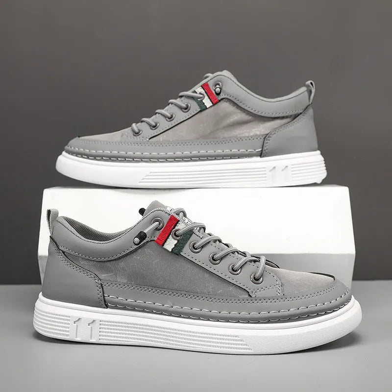 Men's grey high-top canvas bandage sneakers with a round toe on a PVC sole.