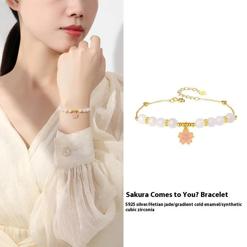Women's pink bracelet with S925 silver cherry blossom pendant and Hetian jade beads in sweet floral style