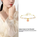 Women's pink bracelet with S925 silver cherry blossom pendant and Hetian jade beads in sweet floral style