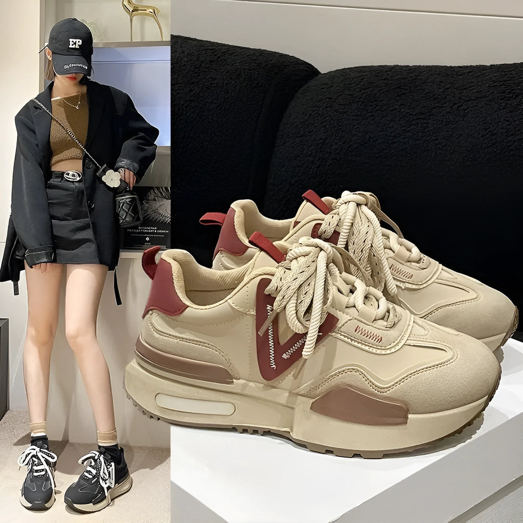 Women's black retro platform sports shoes with round toe and front lace-up design.
