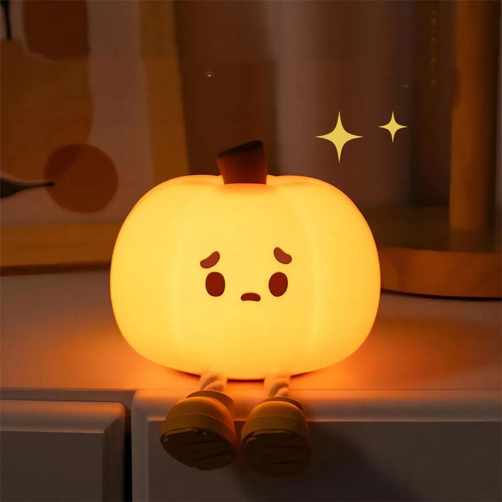 Soft silicone pumpkin night light with USB rechargeable battery and touch dimming controls