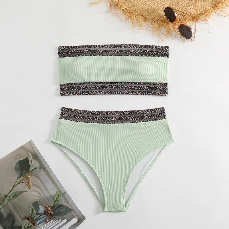 Black strapless swimsuit with leopard print pattern, briefs-style bottoms