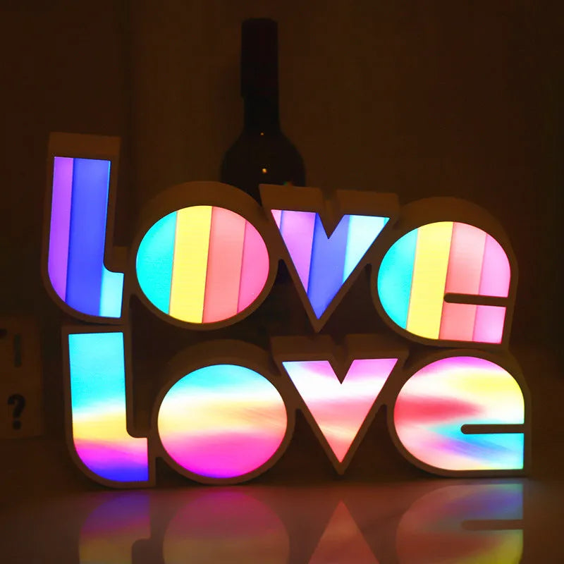 Valentine's Day LED LOVE light with rainbow-style plastic shade, measuring 35.5cm, for romantic room decor