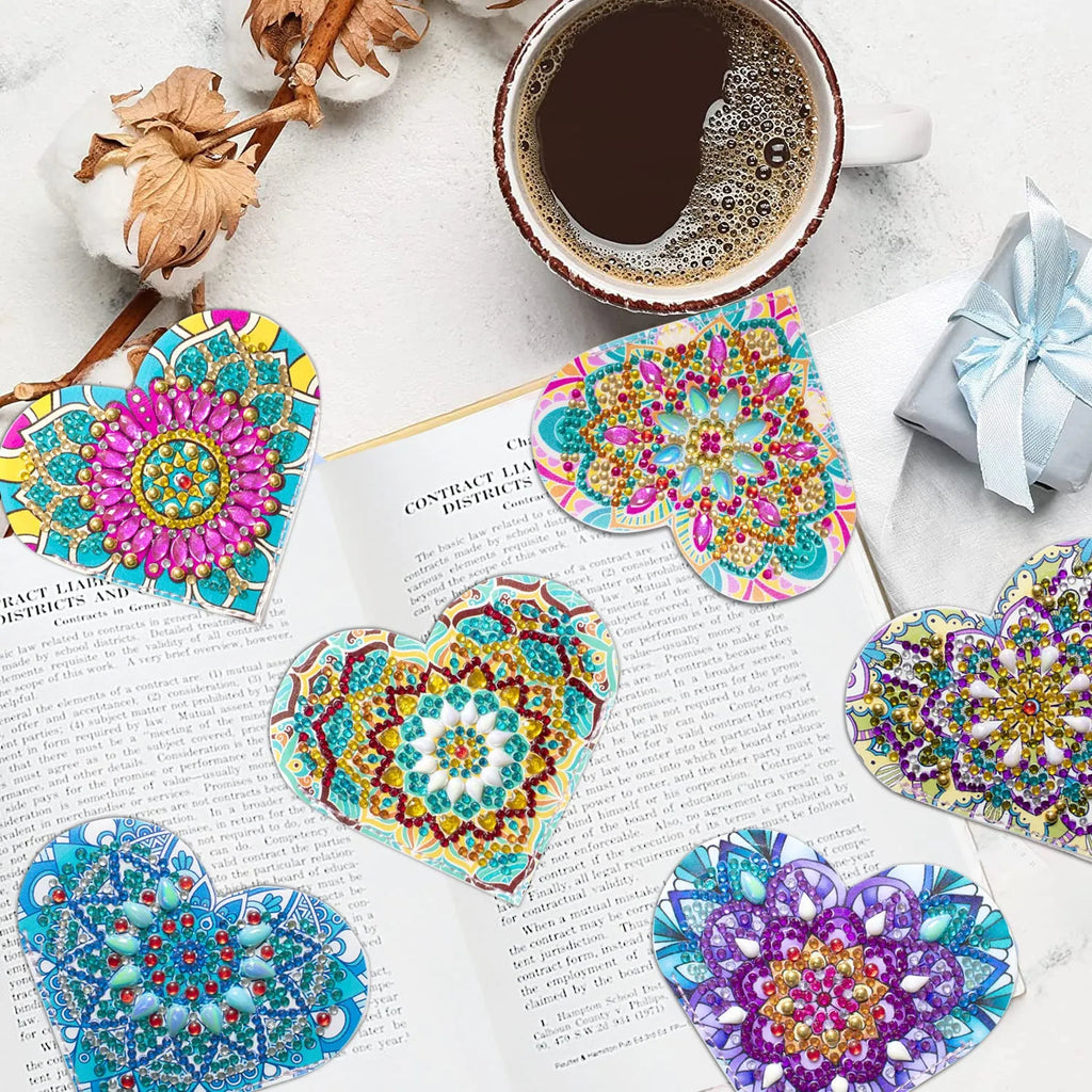 Six PU leather handmade bookmarks with floral cornerite patterns and stick-on crystals for page marking