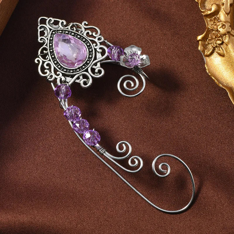 Hand-woven purple crystal clip-on earrings in a right and left pair with mixed material vintage design