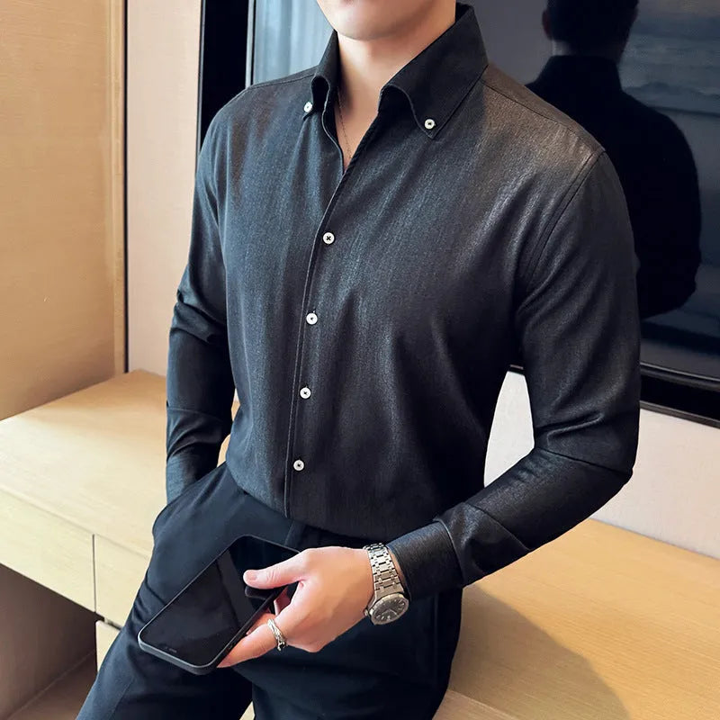 Men's slim fit long-sleeved denim shirt in solid colour on a hanger