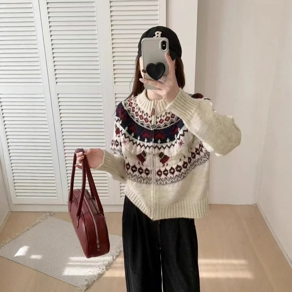 Ethnic jacquard pullover sweater with 3D pattern in apricot colour, showing loose fit and round neck design