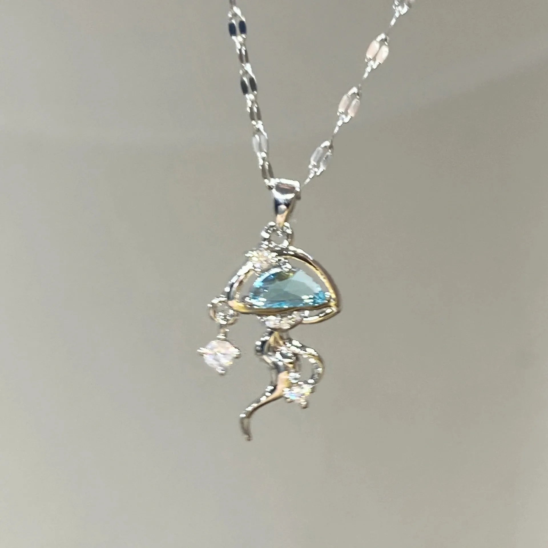 Women's blue jellyfish pendant necklace on adjustable 925 sterling silver chain