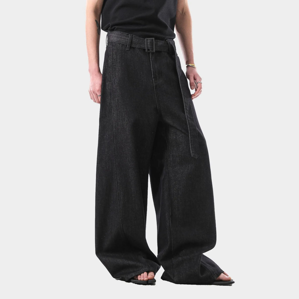Black high-waisted straight-leg cotton denim jeans with zip fly closure on hanger