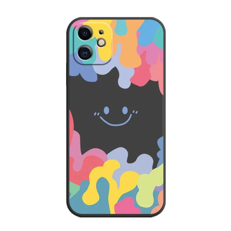 White TPU phone case with rainbow smiley face design and attached black lanyard for Apple iPhone.