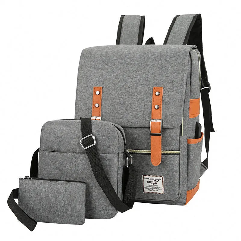 Three-piece business backpack in black with curved shoulder straps, multiple compartments, and waterproof Oxford cloth construction
