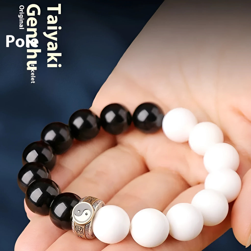 Black and white obsidian bracelet with taiji symbol and geometric beads
