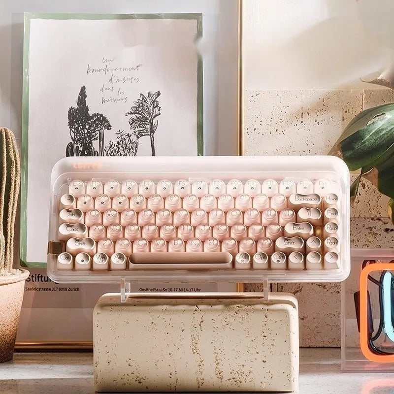Liquid Foundation 84-key wireless mechanical keyboard with mouse, calculator, and pickup light on office desk