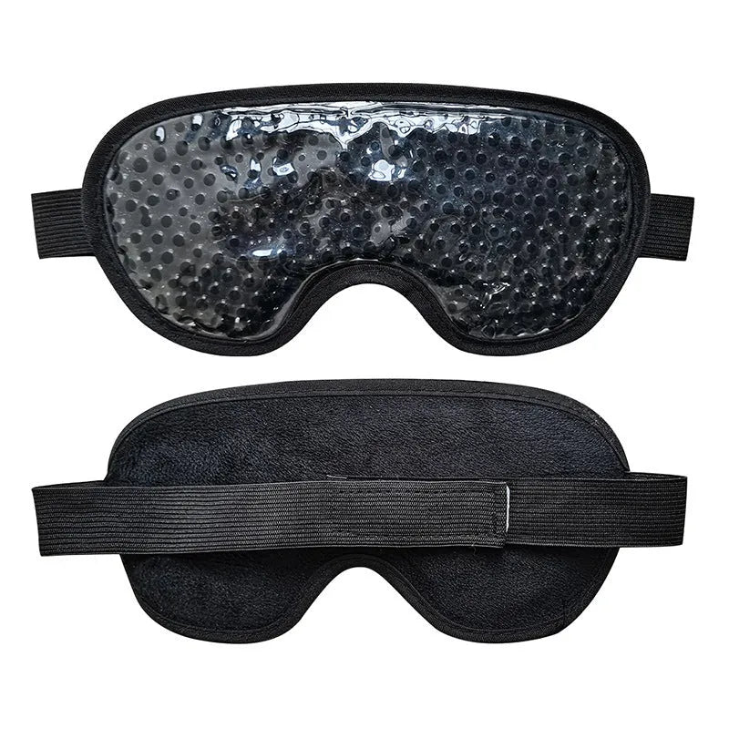 White portable eye therapy device with attached eye mask, showing USB-C charging port and temperature control buttons
