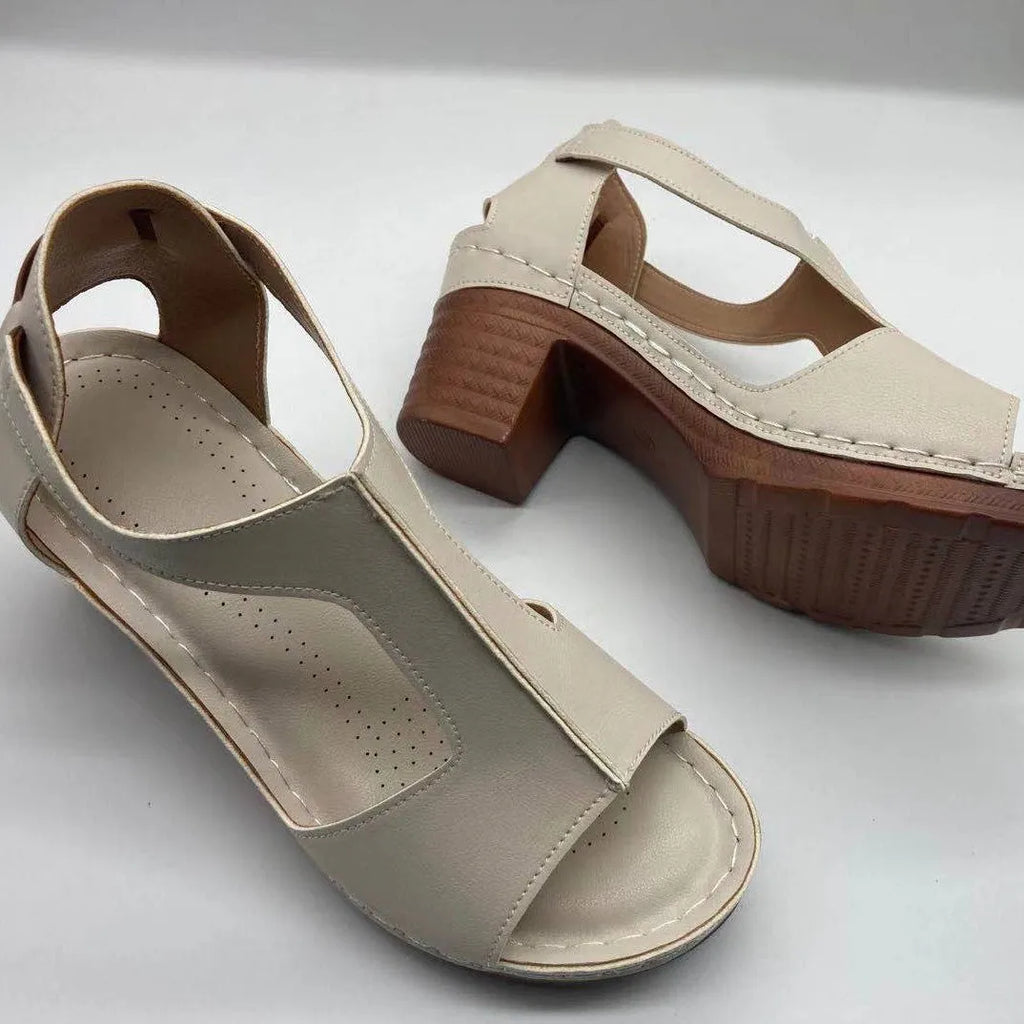 Women's plus size peep toe wedge sandals with a buckle strap in a light brown colour.