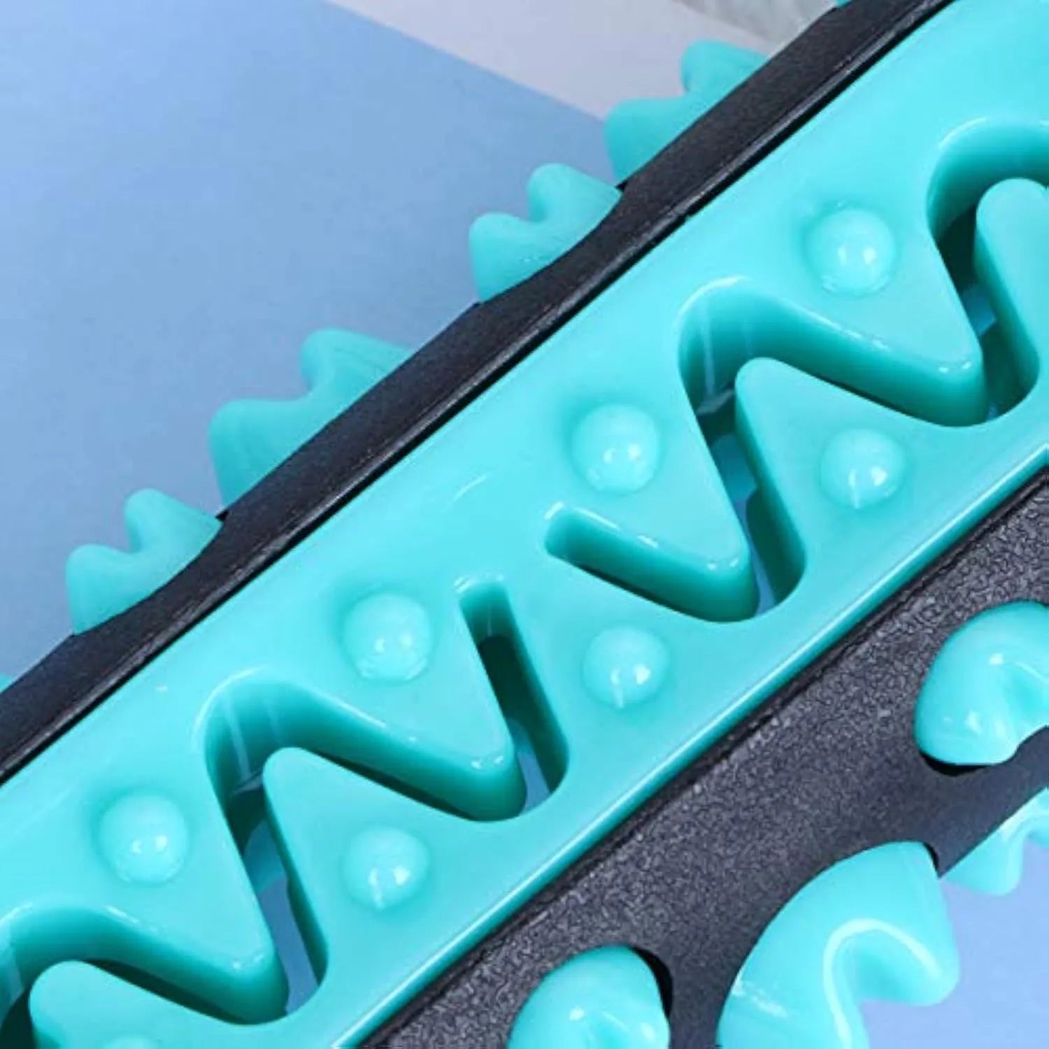 Natural rubber dog toothbrush chew toy in blue colour, measuring 15cm long, for dental cleaning and boredom reduction