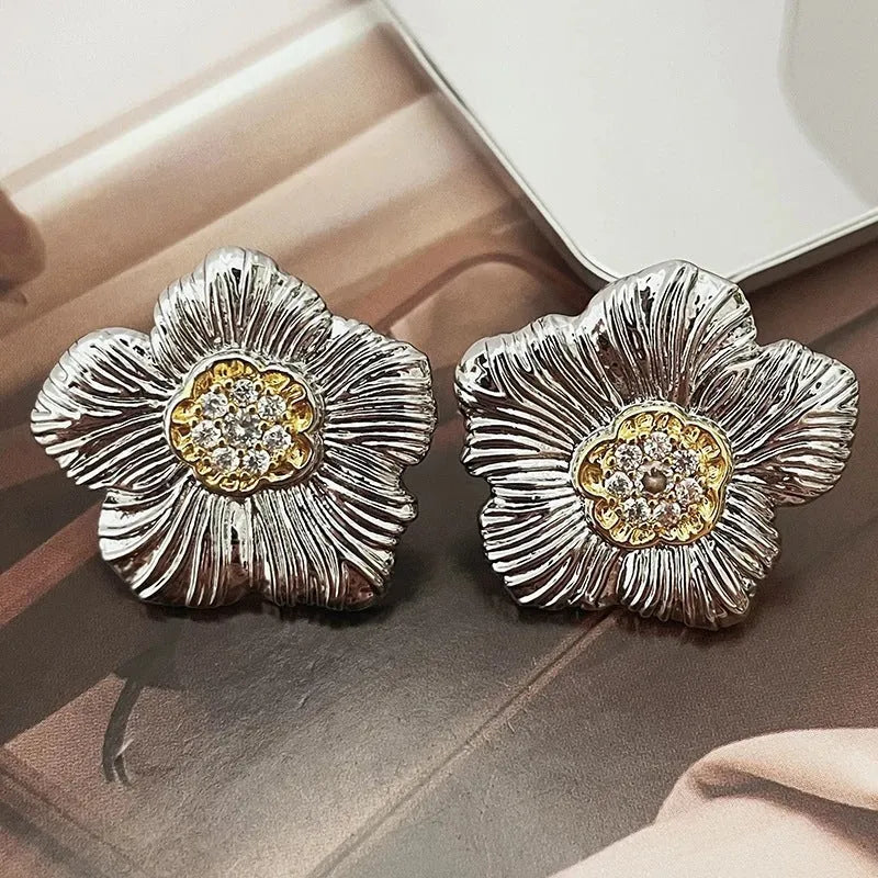 Retro gardenia stud earrings with textured floral design and two-tone electroplated finish