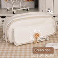 Large capacity canvas pencil case in green, beige, blue, and grey colours, holding approximately 80 pens.