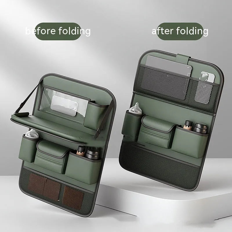 Black leather car seat storage bag with a foldable dining table deployed, hanging behind a car headrest