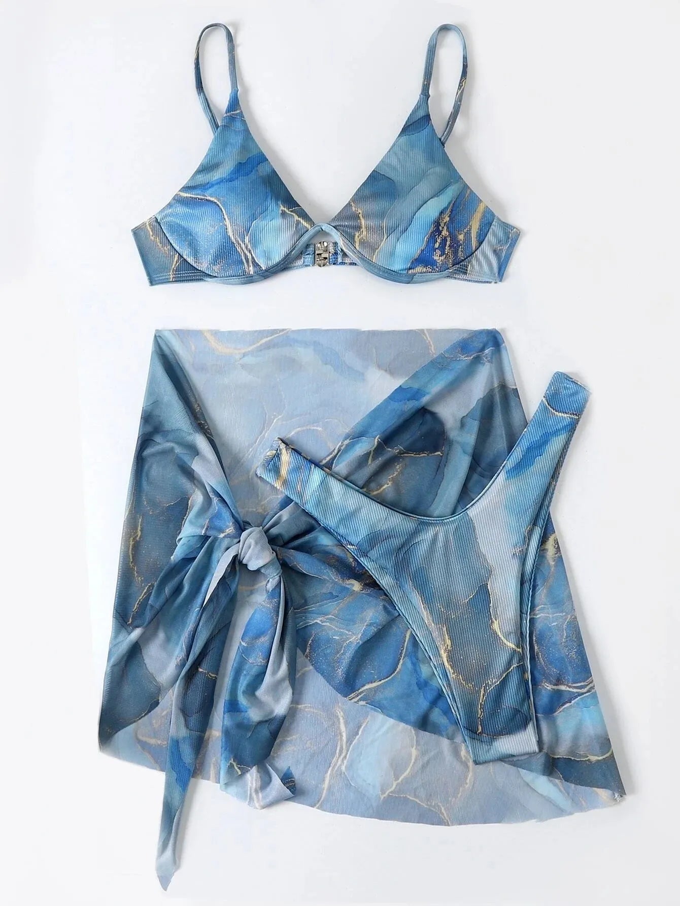 Women's marble print bikini swimwear set showing bra, panties, and skirt in green colour.