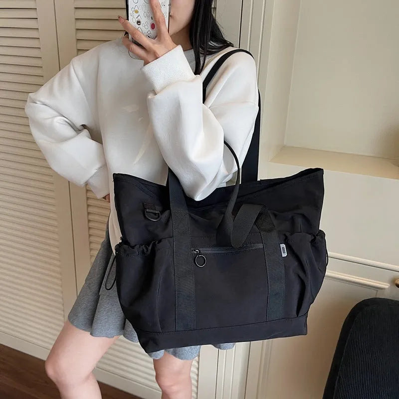 Women's lightweight oxford cloth travel bag with letter pattern in black, grey or green