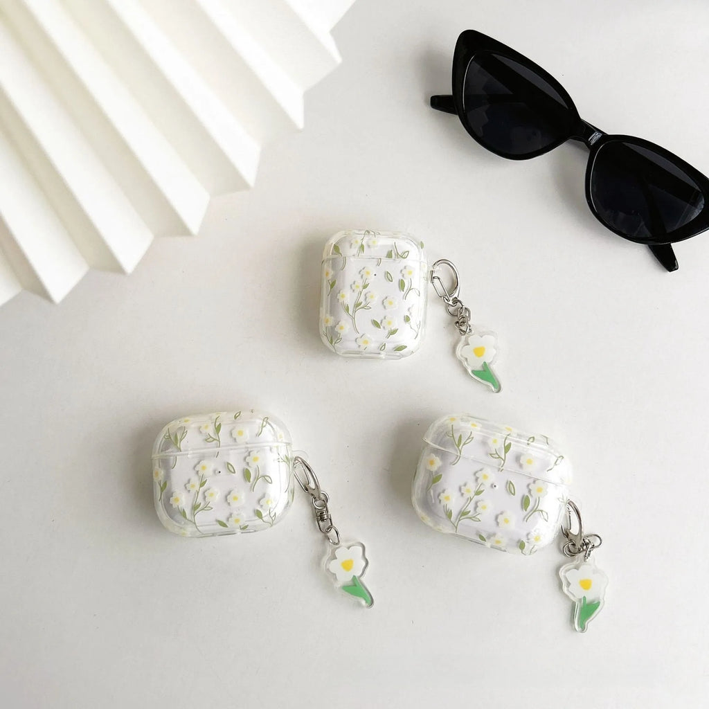 White floral design AirPods protective cover showing high-transparency TPU material and decorative elements