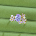 Women's open ring with flower pearl design and zircon details in yellow colour