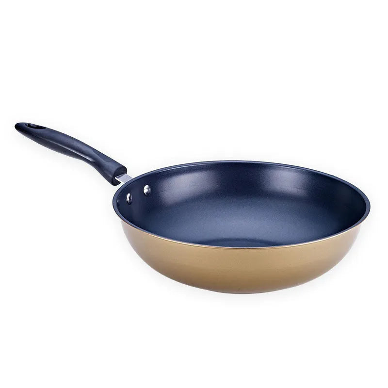 Cast iron three-piece cookware set with soup pot, milk pot, and wok on a kitchen counter
