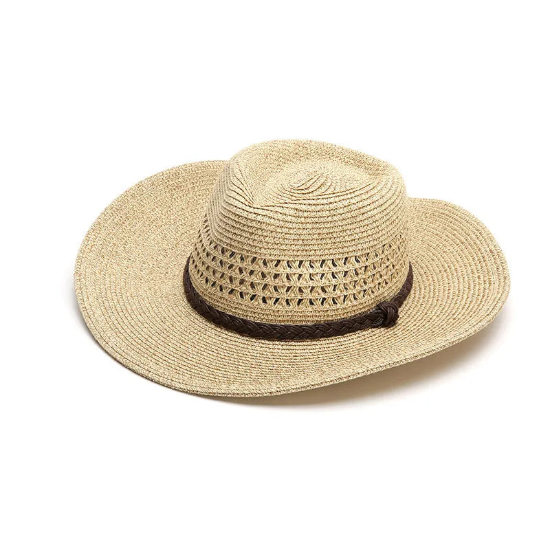 Men's foldable wide-brim straw sun hat in beige, showing its packable design.