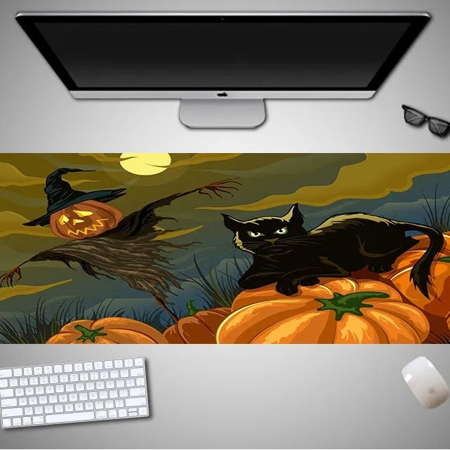 Oversized Halloween-themed mouse pad on desk with non-slip rubber cloth base and large surface area