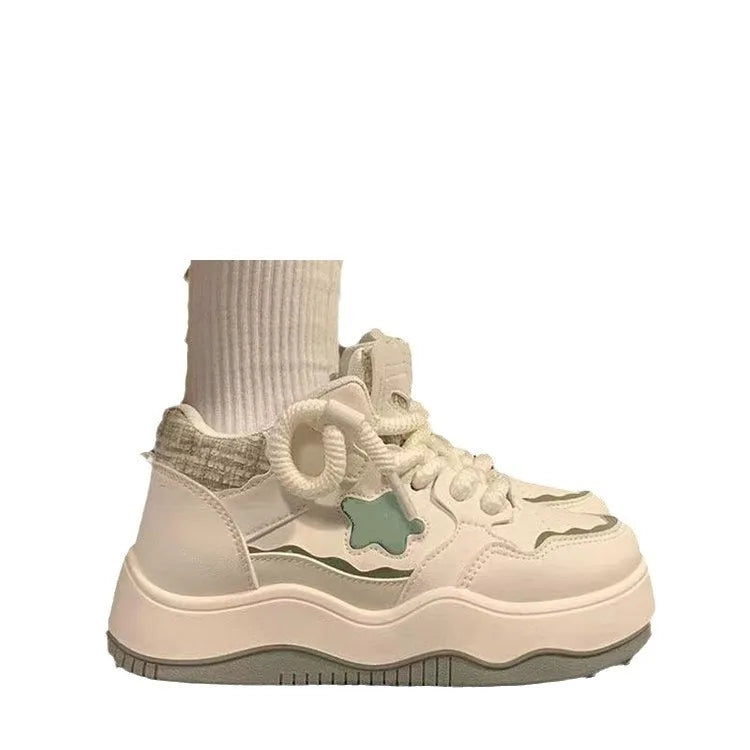 Women's green and pink artificial PU platform sneaker with front lace-up and round toe.