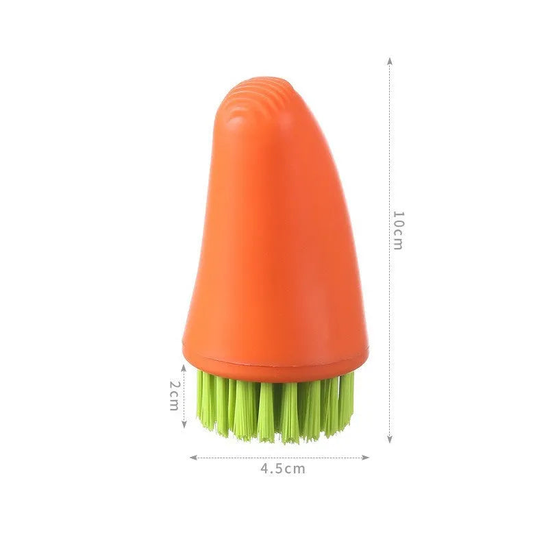 White and orange carrot-shaped kitchen cleaning brush with nylon bristles and a 15cm handle.