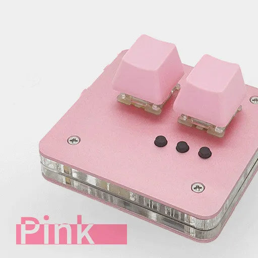 Compact plastic USB keyboard with multimedia keys in black, grey, pink, or white.