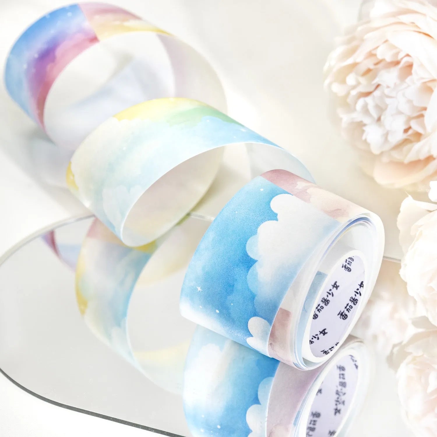 Japanese paper decorative tape roll with sky theme designs showing colourful clouds, twilight, and moonlight sky colour variations