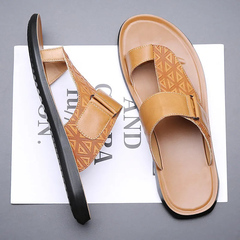 Men's simple beach slippers in cowhide with rubber sole, shown in light brown colour