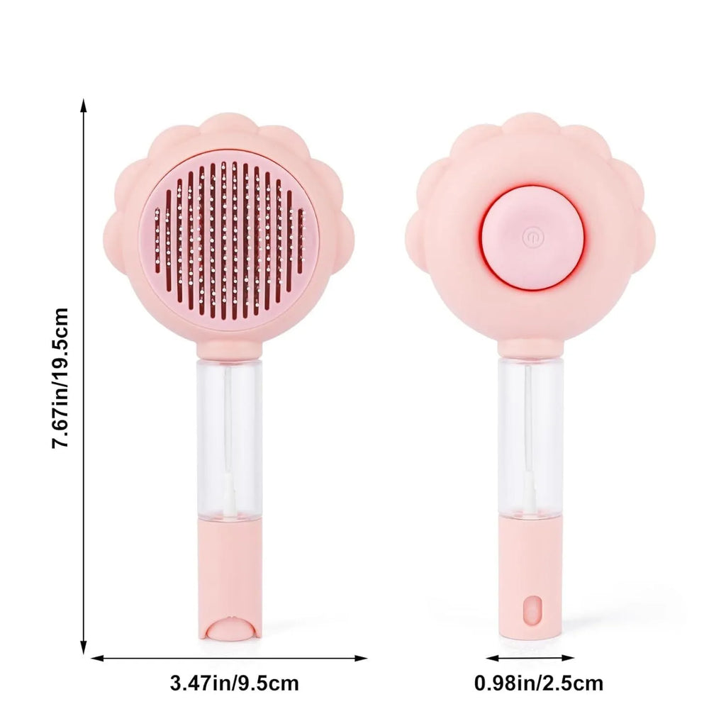 Spray cat brush with grey handle, curved metal pins, and release button for pet grooming and hair removal
