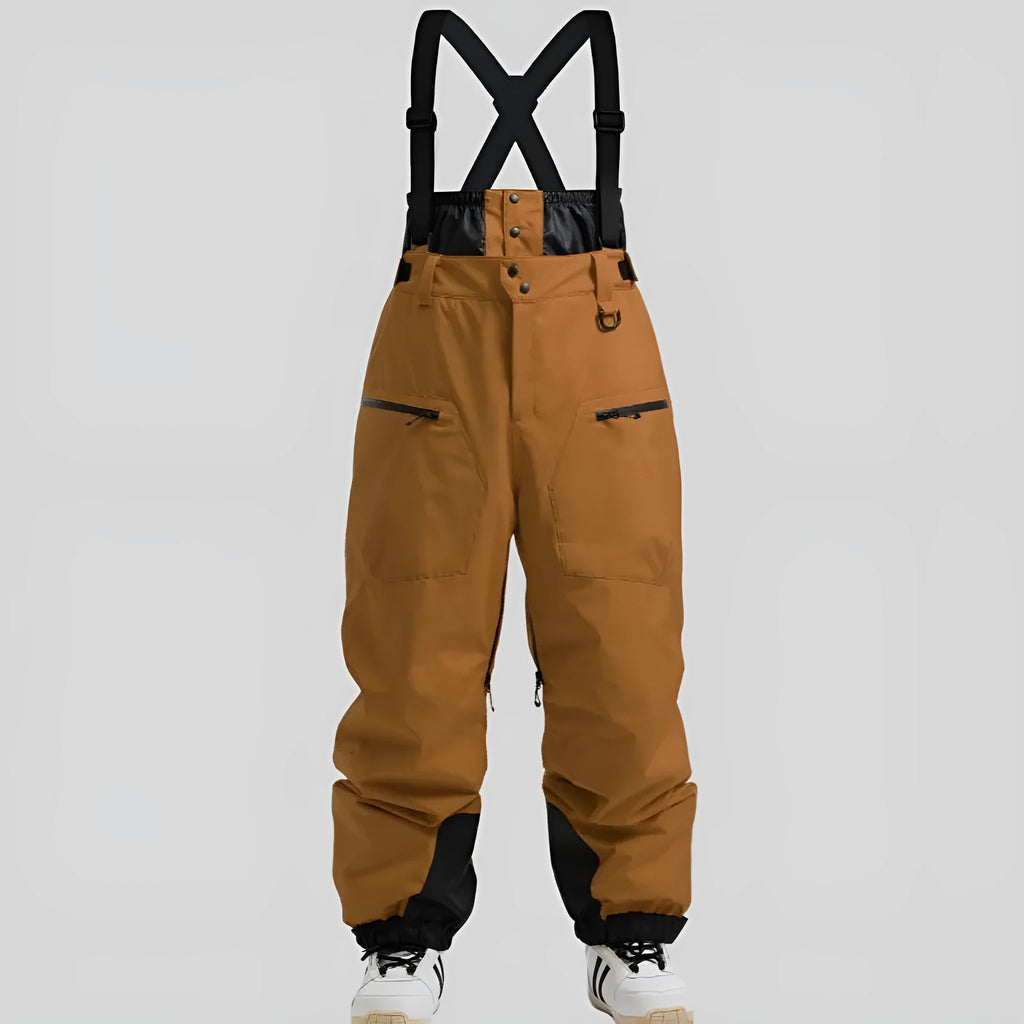 Man modelling black waterproof ski trousers with an adjustable calf strap.