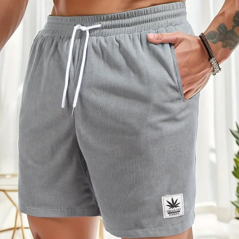 Men's elastic polyester drawstring leisure shorts in black, blue, khaki, or grey colours