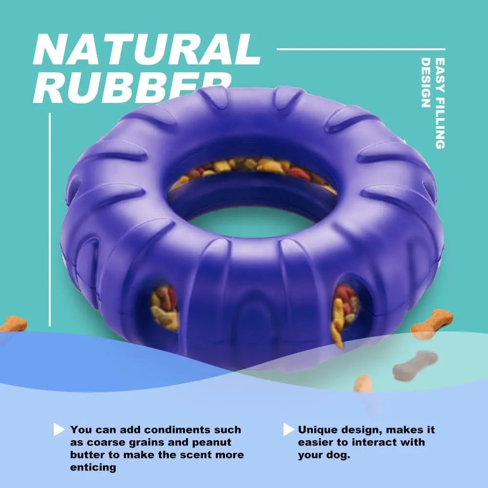 Blue rubber dog chew toy shaped like a tyre with oval openings for food dispensing, measuring 11cm by 4cm