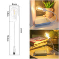 USB rechargeable folding tungsten night light with glowing S14 bulb on a table.
