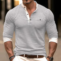 Men's long sleeve round neck t-shirt in solid colours like black and green, made from 100% cotton, showing casual fit