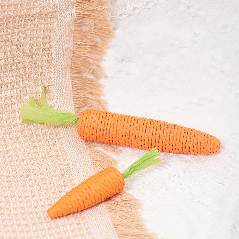 Interactive cat toy set with carrot-shaped toys, crinkle paper, ringing stones, extendable stick, and dental care chewing sticks